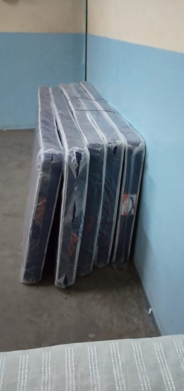 New mattresses wrapped in plastic